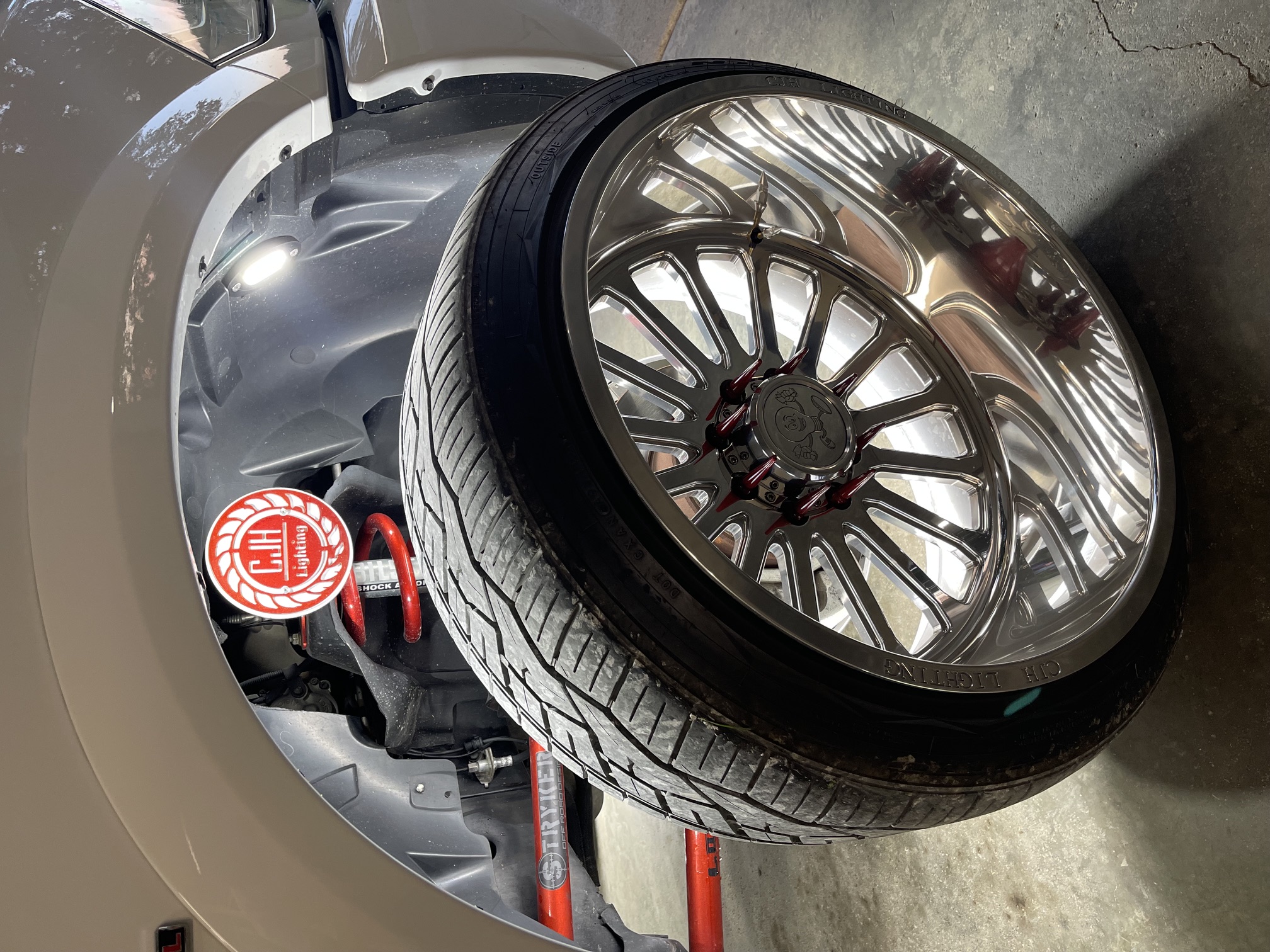 Custom polished wheel build with CJH Lighting sticker